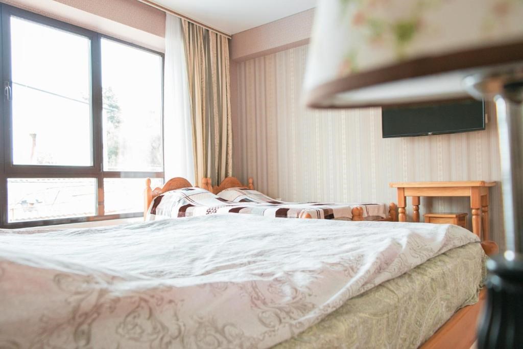 Улучшенный четырёхместный номер в Колибри Beach