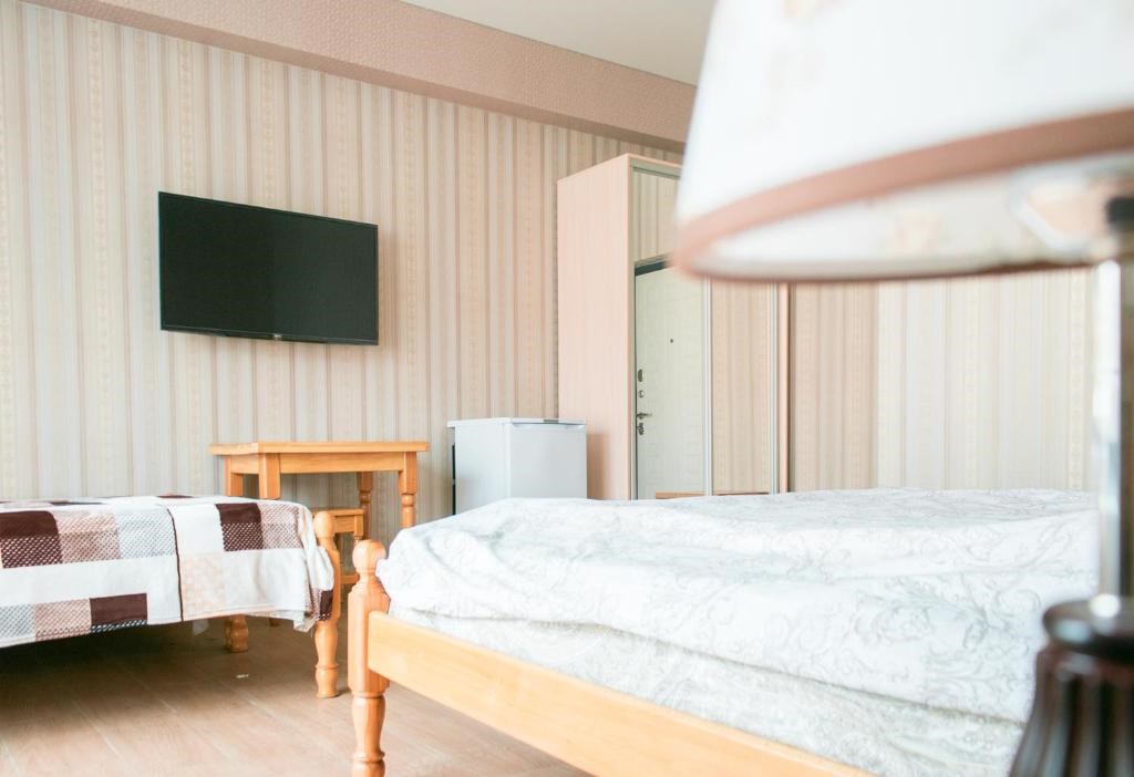 Улучшенный четырёхместный номер в Колибри Beach