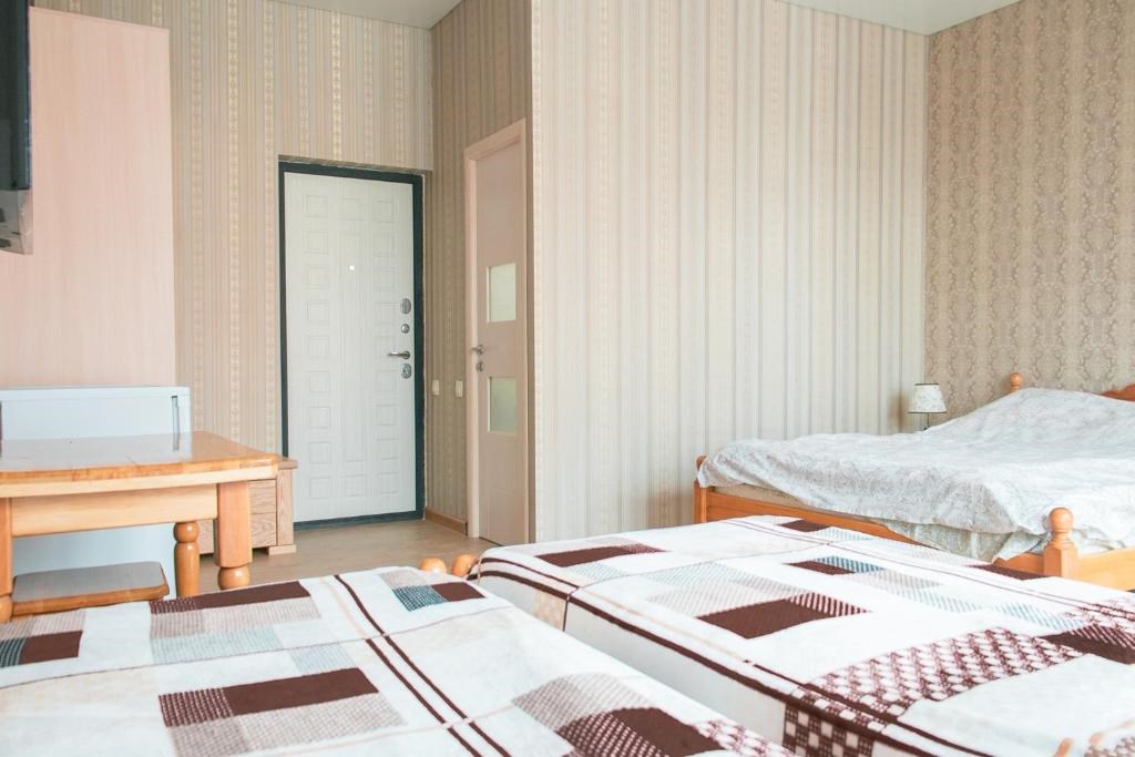 Улучшенный четырёхместный номер в Колибри Beach