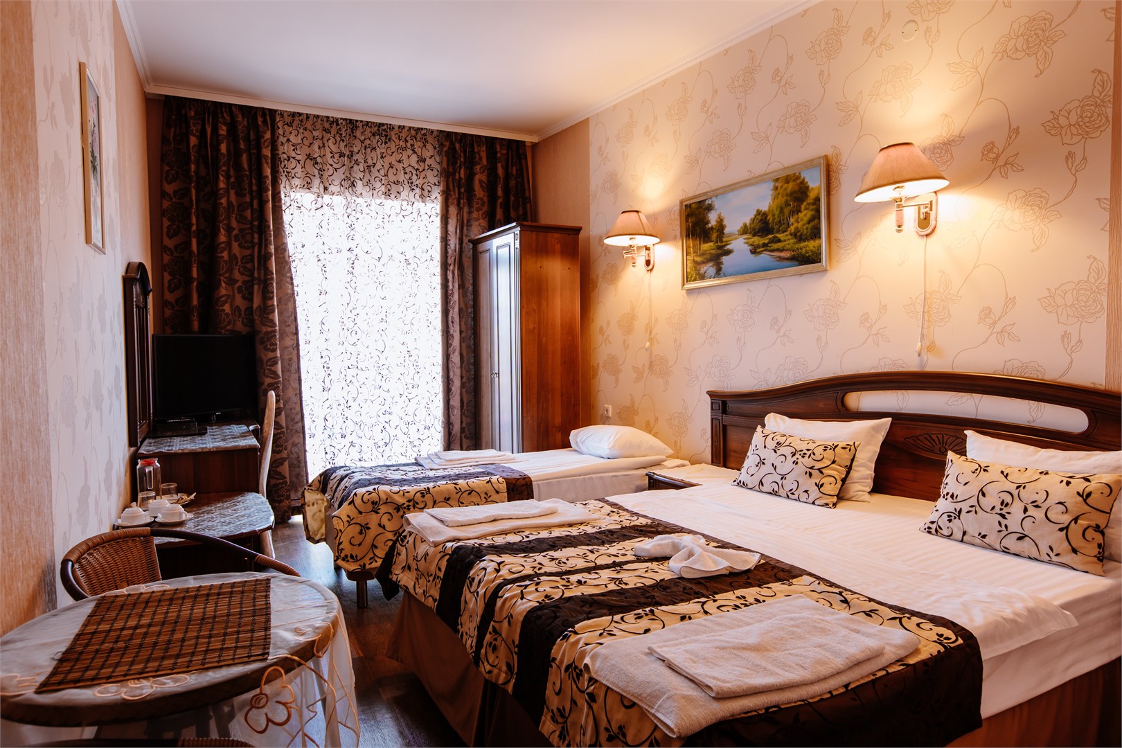 Фотография Улучшенный 3-местный с балконом