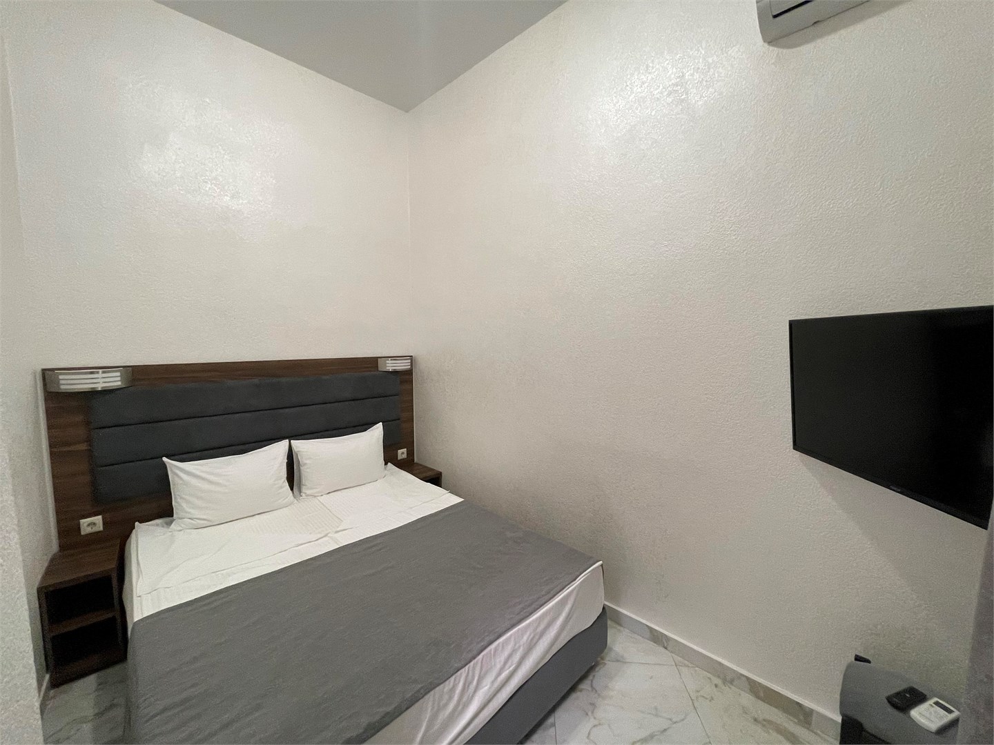 Фотография Двухкомнатный номер с сауной и джакузи