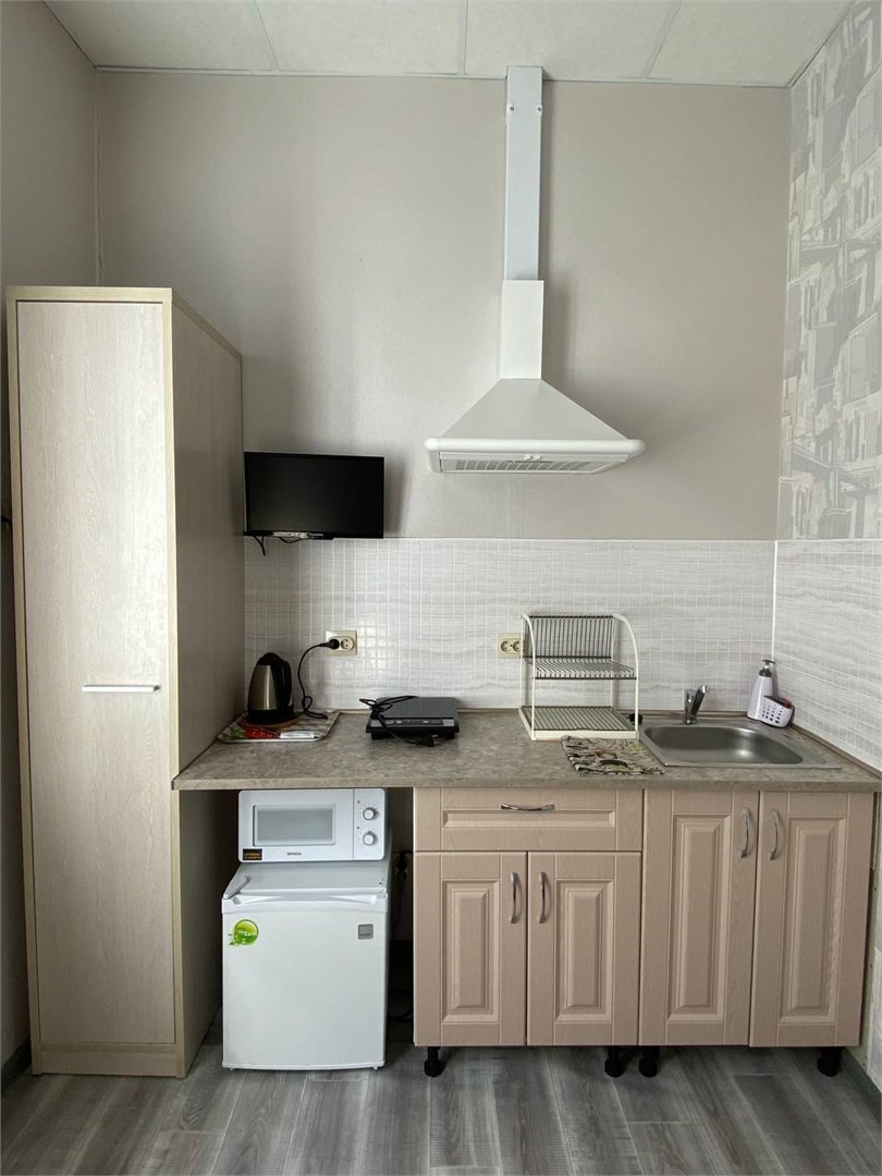 Двухкомнатная студия с двуспальной кроватью в Атмосфера