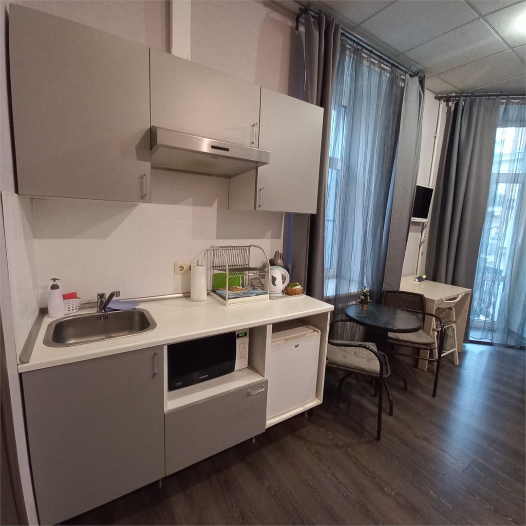 Студия с балконом в Атмосфера