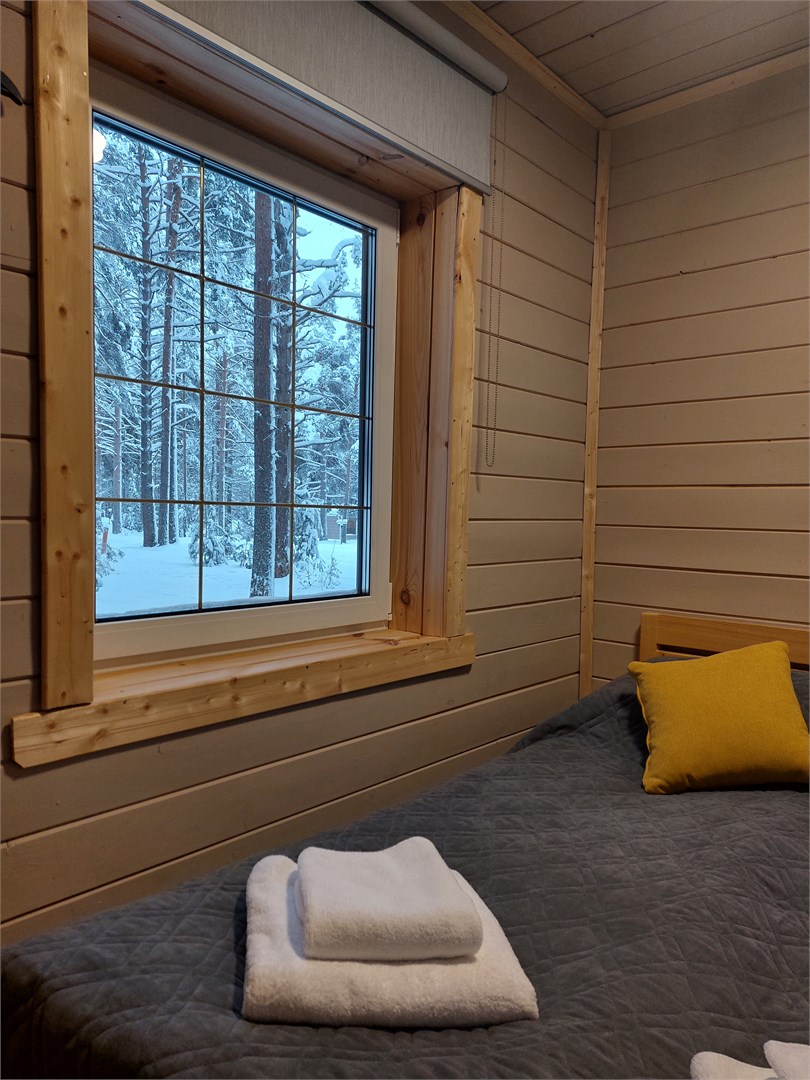 Семейный коттедж с террасой и панорамным остеклением в Морошка