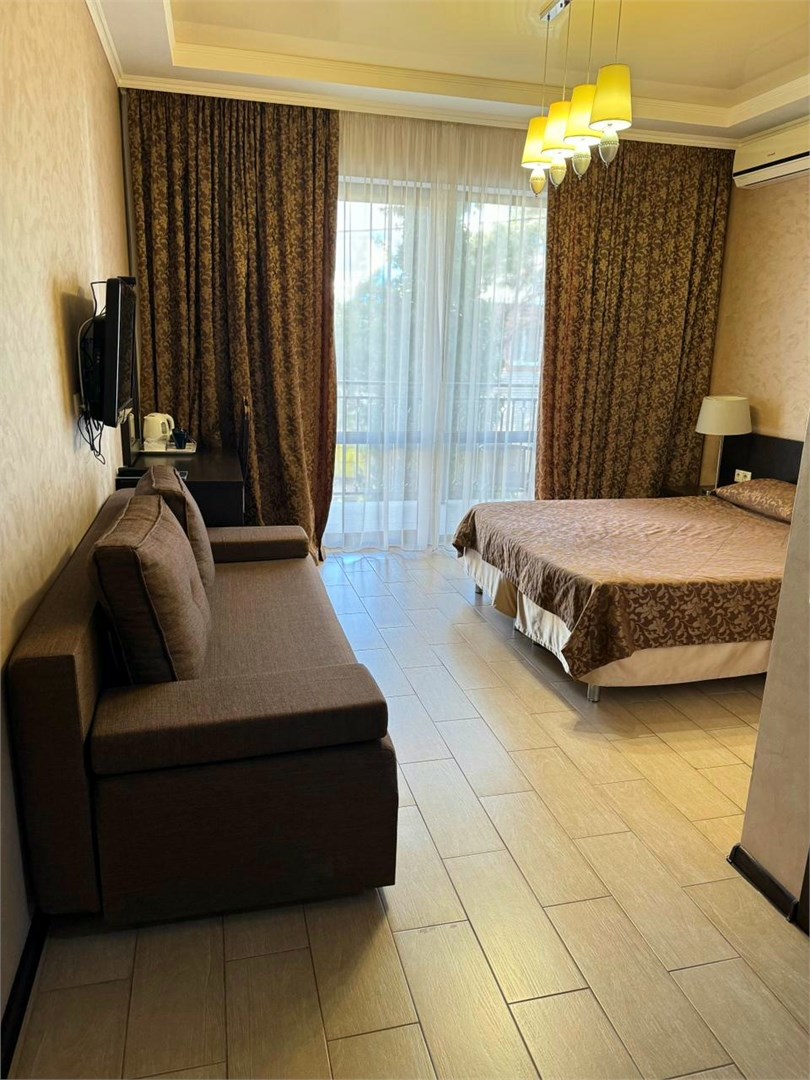 Четырехместный полулюкс с балконом в Dallas