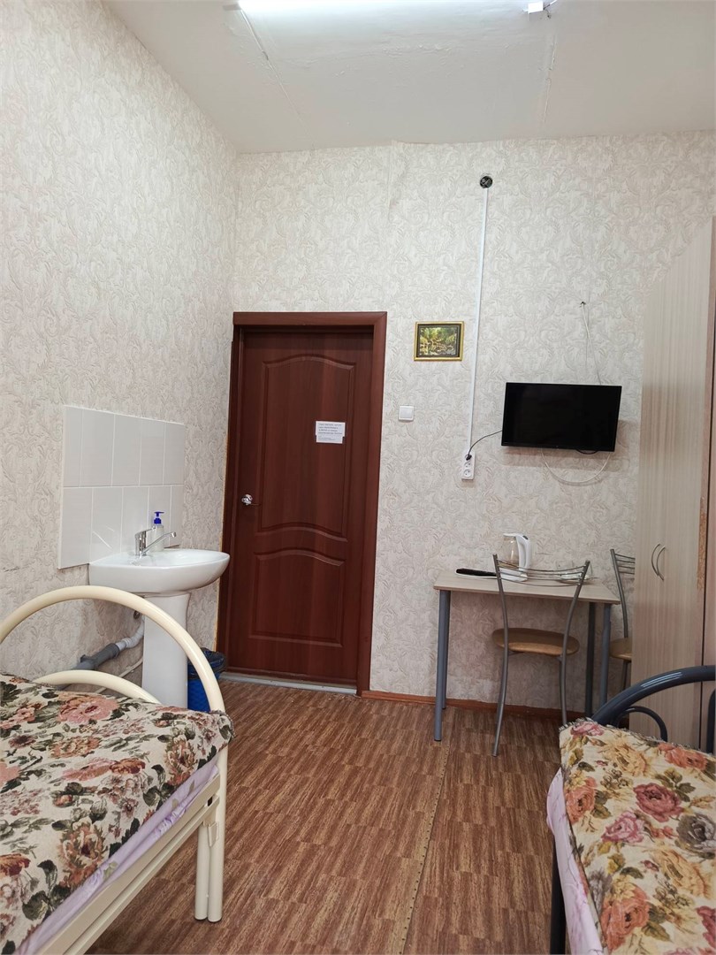 Двухместный улучшенный номер с двумя односпальными кроватями в Северяночка