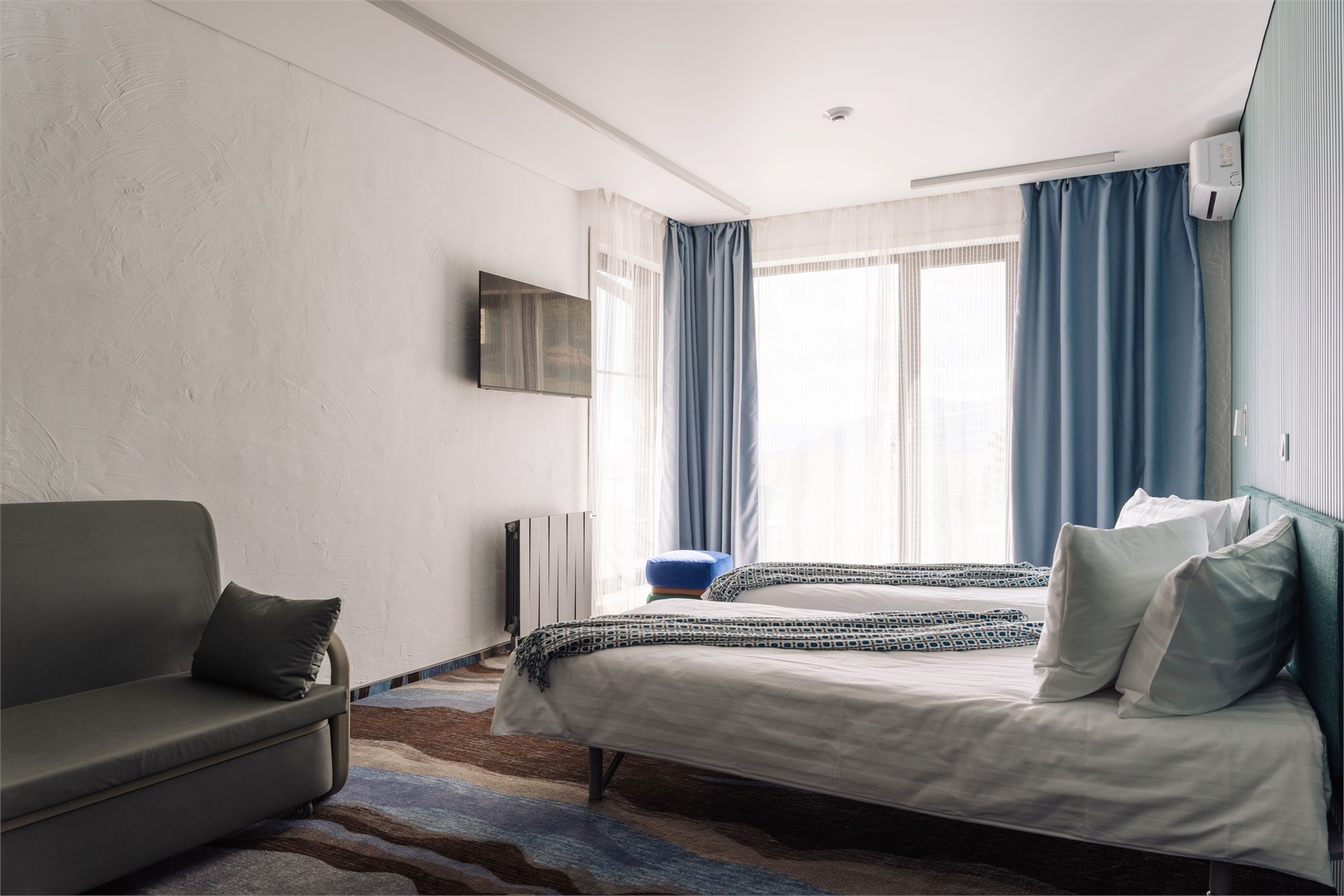 Стандарт с большой двуспальной кроватью или двумя раздельными в Азатай