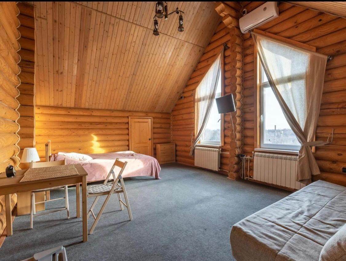 люкс мансардный семейный в Семейный гостевой дом