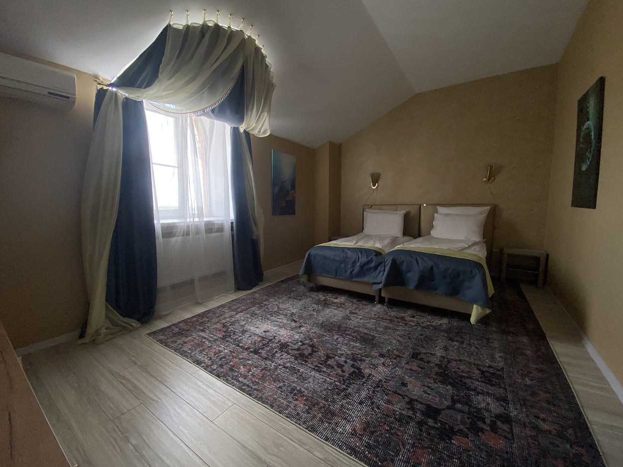 Семейный номер с двумя спальнями в Над рекой