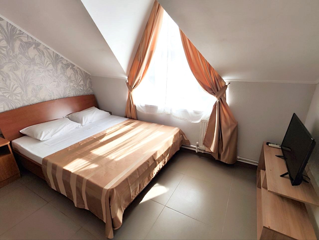 Апартаменты на 4м мансардном этаже в Регион 86