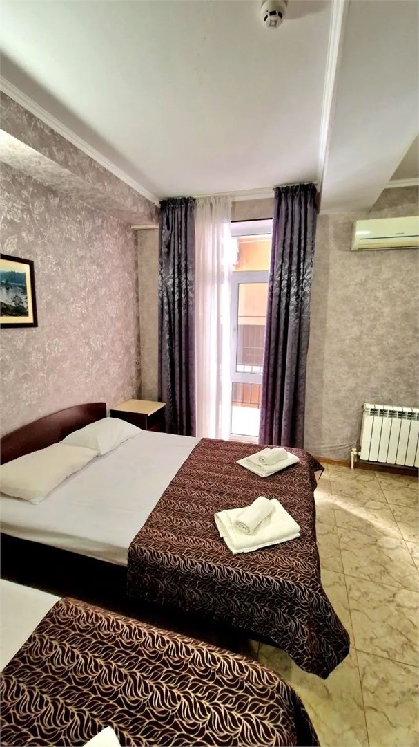 стандарт четырехместный с балконом в Посейдон 2